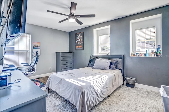 16755 Sunrise Vista Dr, Clermont, FL 34714 - bedroom with baseboards and ceiling fan
