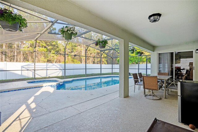 16755 Sunrise Vista Dr, Clermont, FL 34714 - view of swimming pool with a fenced backyard, a lanai, and a patio