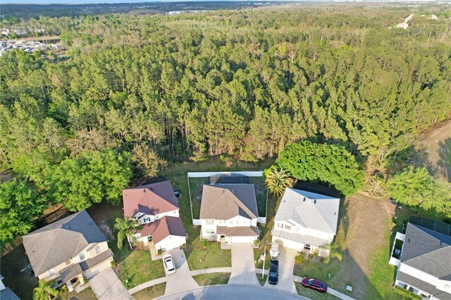 16755 Sunrise Vista Dr, Clermont, FL 34714 - bird's eye view with a forest view and a residential view