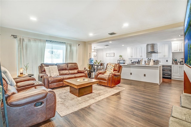 16755 Sunrise Vista Dr, Clermont, FL 34714 - living room featuring visible vents, recessed lighting, and wood finished floors