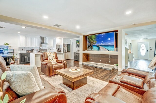 16755 Sunrise Vista Dr, Clermont, FL 34714 - living area featuring light wood finished floors, baseboards, visible vents, and recessed lighting
