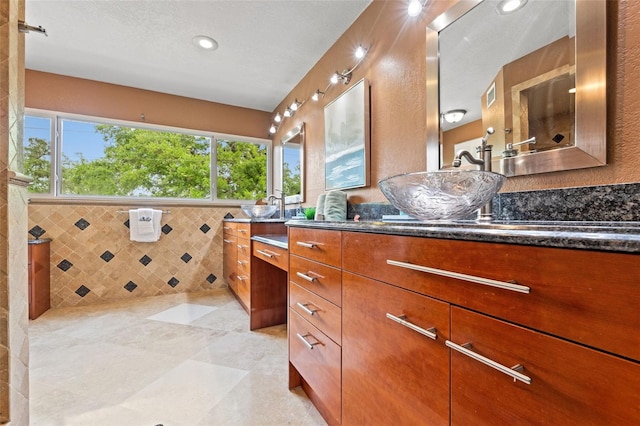 4522 W N B St, Tampa, FL 33609 - full bathroom featuring tile walls, visible vents, and vanity