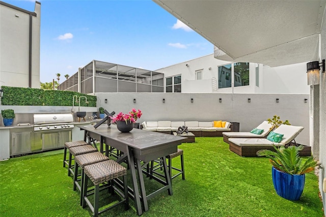 4522 W N B St, Tampa, FL 33609 - view of yard featuring an outdoor living space and an outdoor kitchen