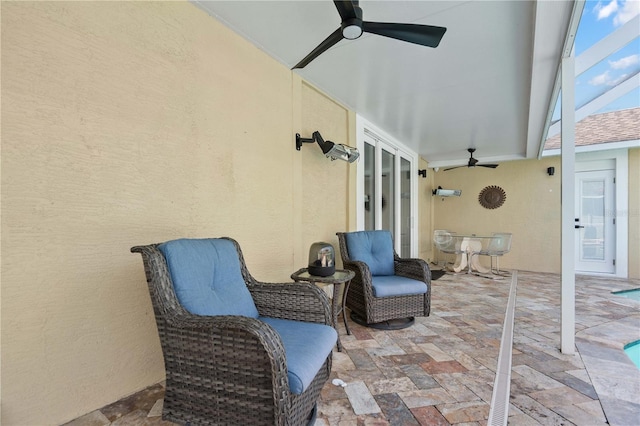 view of patio with ceiling fan