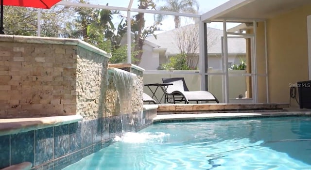 pool featuring glass enclosure