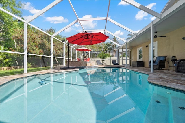 pool with a patio, a lanai, and central air condition unit