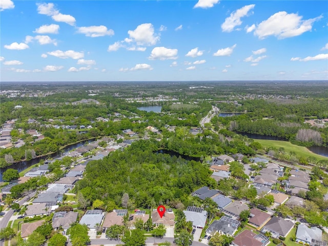 aerial view with a residential view and a water view