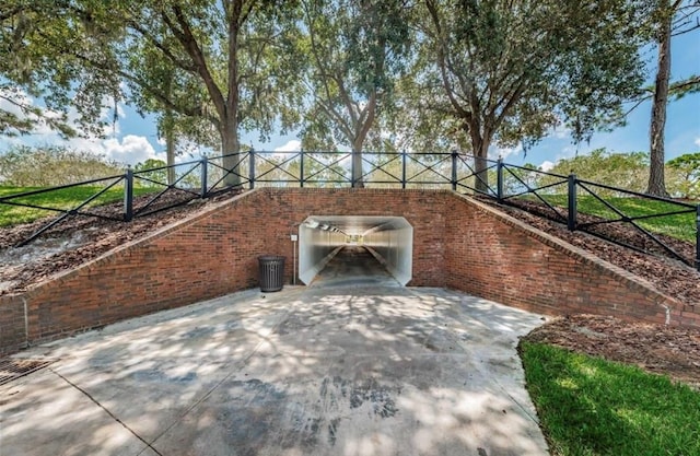 view of patio featuring fence