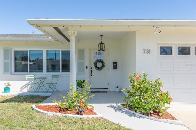 doorway to property with stucco siding