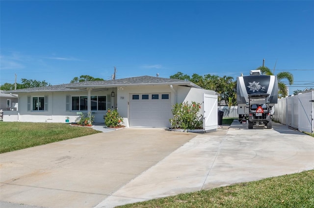 ranch-style home with fence, a garage, concrete driveway, a front lawn, and stucco siding