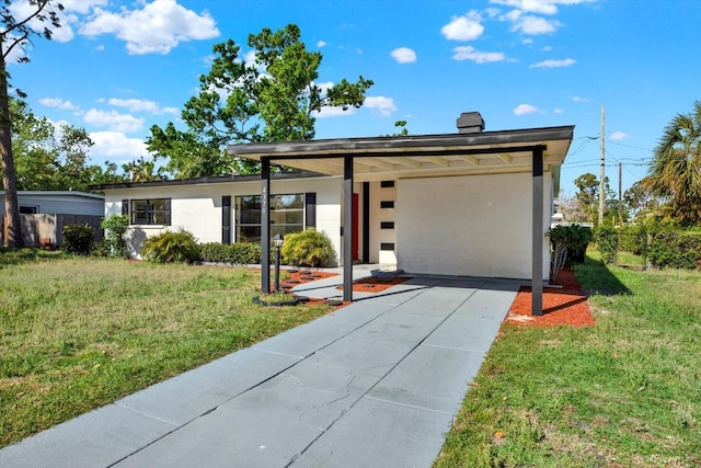 ranch-style home with fence and a front lawn