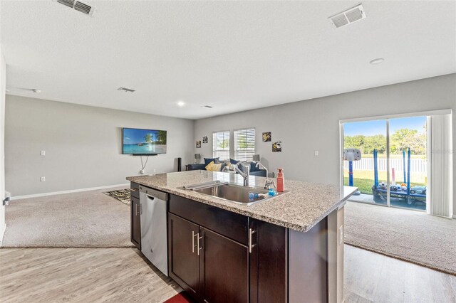 12856 French Market Dr, Riverview, FL 33579 - kitchen with a sink, open floor plan, visible vents, and dishwasher