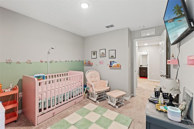 12856 French Market Dr, Riverview, FL 33579 - carpeted bedroom with baseboards, visible vents, and a crib
