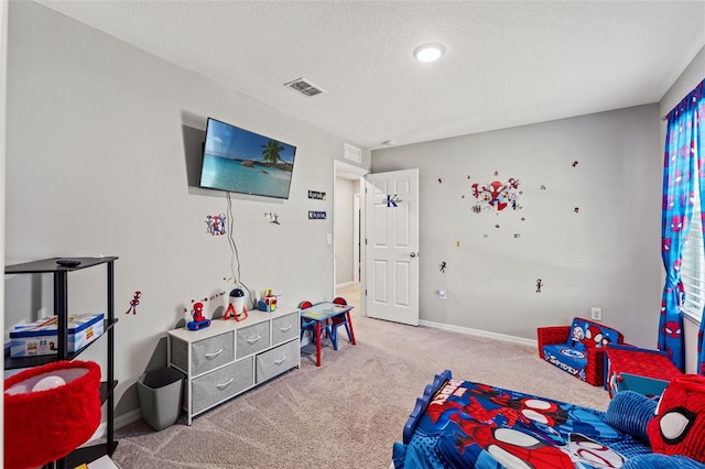 12856 French Market Dr, Riverview, FL 33579 - bedroom featuring carpet floors, a textured ceiling, baseboards, and visible vents