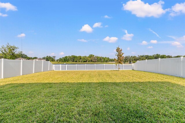 12856 French Market Dr, Riverview, FL 33579 - view of yard featuring a fenced backyard