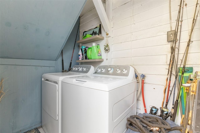 1134 9th Ave S, Saint Petersburg, FL 33705 - laundry room with washing machine and clothes dryer, laundry area, and wood walls