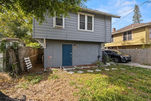 1134 9th Ave S, Saint Petersburg, FL 33705 - rear view of house with fence