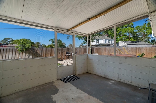 view of patio / terrace featuring fence