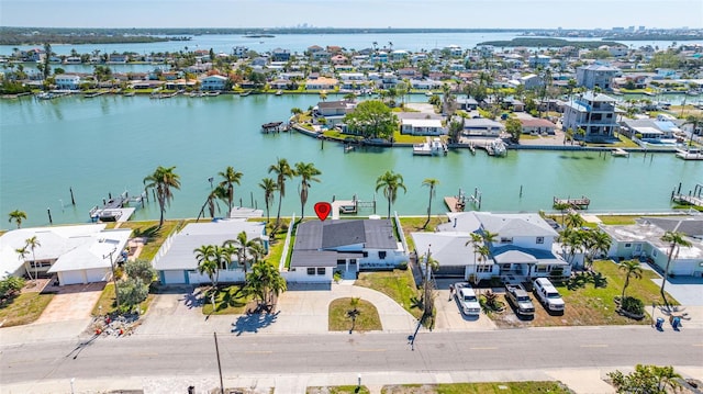bird's eye view with a residential view and a water view