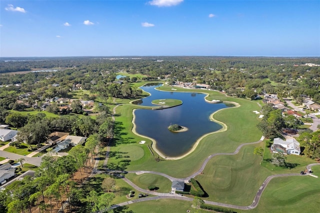 birds eye view of property featuring a water view, view of golf course, and a forest view
