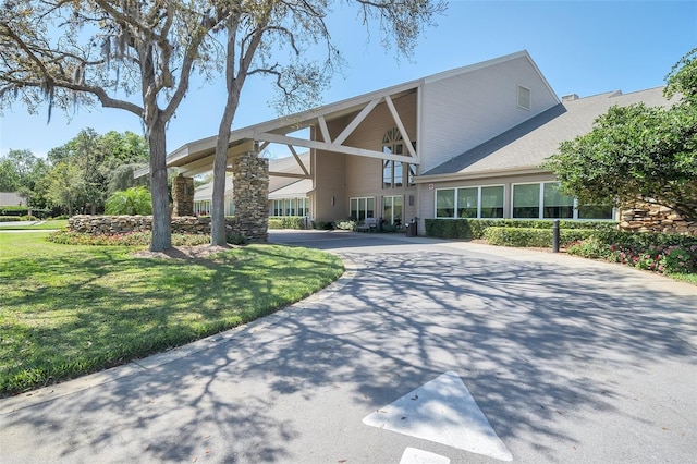 view of building exterior with driveway
