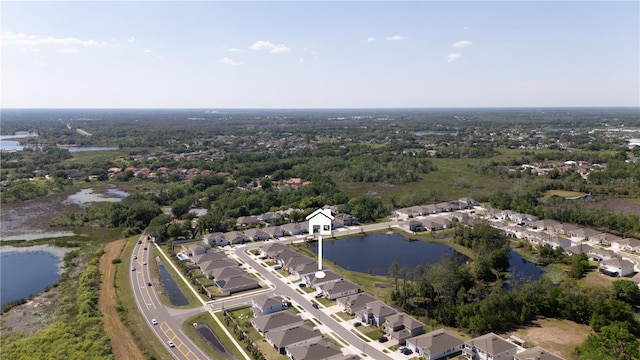aerial view with a water view and a residential view