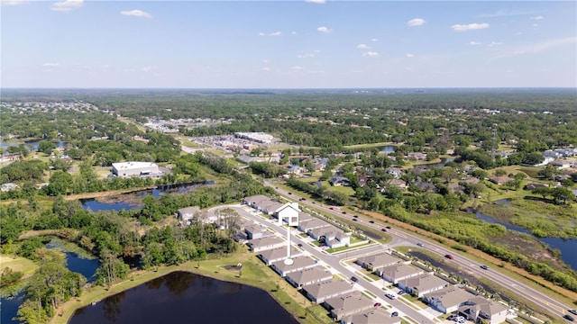 birds eye view of property with a residential view and a water view