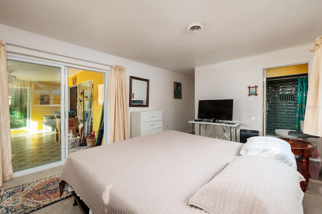 bedroom featuring visible vents