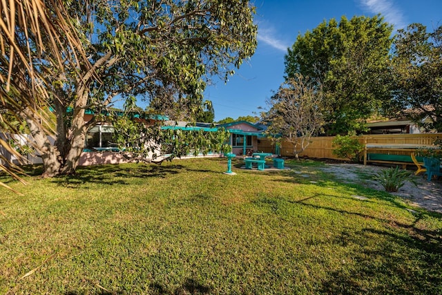 view of yard with fence
