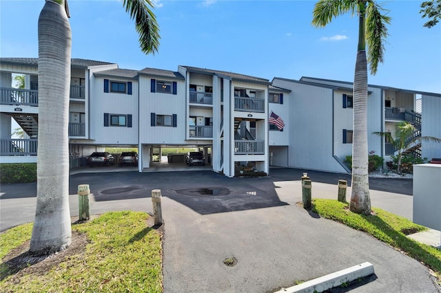 view of property with covered parking