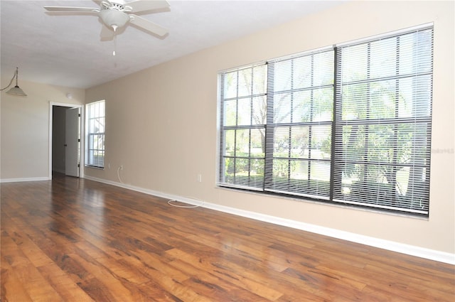 3358 Mermoor Dr Unit 2106, Palm Harbor, FL 34685 - unfurnished room with baseboards, wood finished floors, and a ceiling fan