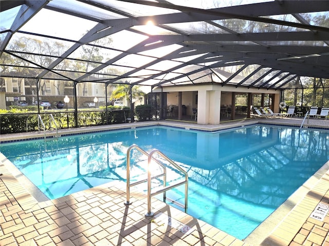 3358 Mermoor Dr Unit 2106, Palm Harbor, FL 34685 - pool with glass enclosure and a patio
