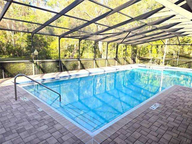 3358 Mermoor Dr Unit 2106, Palm Harbor, FL 34685 - community pool featuring glass enclosure and a patio