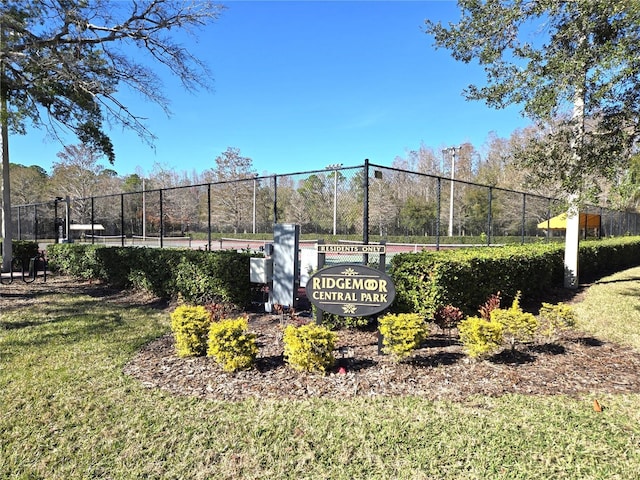 3358 Mermoor Dr Unit 2106, Palm Harbor, FL 34685 - view of tennis court featuring fence and a yard