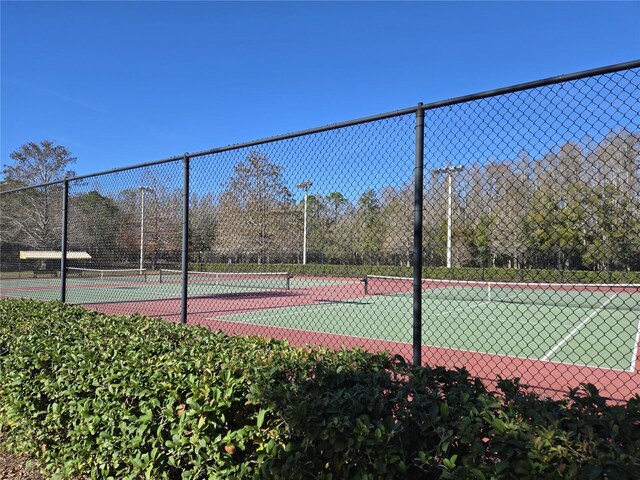 3358 Mermoor Dr Unit 2106, Palm Harbor, FL 34685 - view of sport court featuring fence