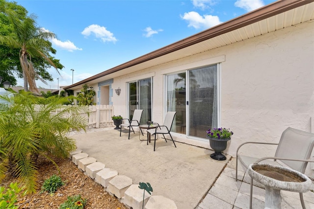 view of patio with fence