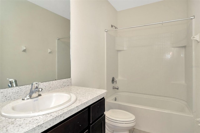 bathroom featuring tub / shower combination, vanity, toilet, and tile patterned floors