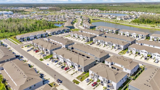 aerial view featuring a residential view and a water view