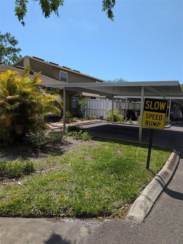 7112 Eldorado Dr, Tampa, FL 33615 - exterior space with a detached carport and fence