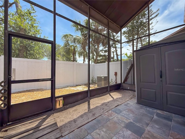 unfurnished sunroom featuring french doors