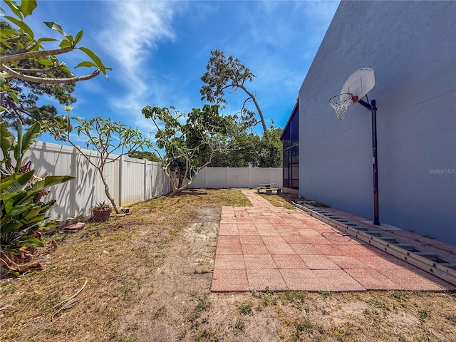 view of yard with a patio area and a fenced backyard