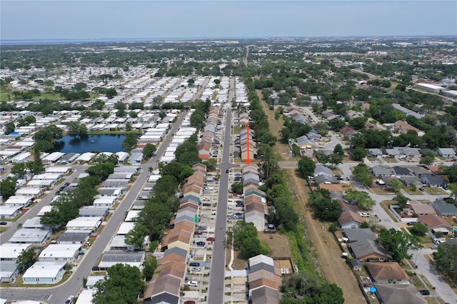 bird's eye view featuring a residential view and a water view
