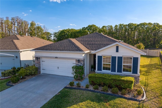 1044 Manzanar Pl, Wesley Chapel, FL 33543 - ranch-style home with a garage, stone siding, a front lawn, stucco siding, and concrete driveway