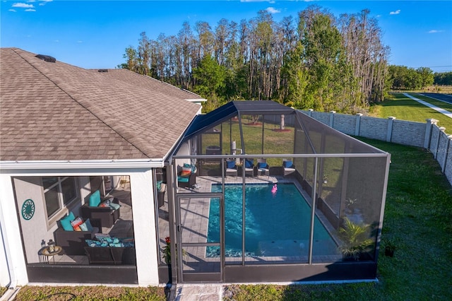 1044 Manzanar Pl, Wesley Chapel, FL 33543 - view of swimming pool featuring a patio area and glass enclosure