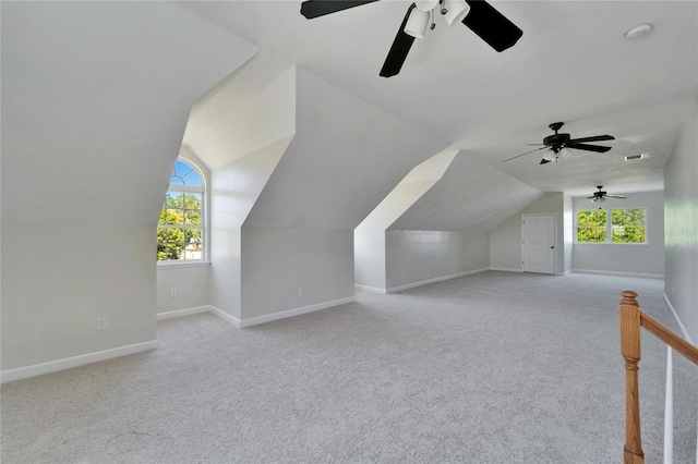 14807 Capps Estates Ln, Wimauma, FL 33598 - additional living space with ceiling fan, plenty of natural light, carpet, and lofted ceiling