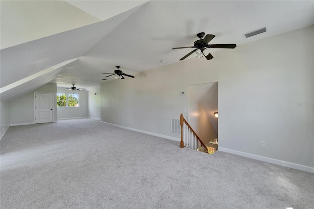 14807 Capps Estates Ln, Wimauma, FL 33598 - unfurnished living room featuring carpet floors, ceiling fan, and lofted ceiling