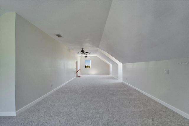 14807 Capps Estates Ln, Wimauma, FL 33598 - additional living space featuring carpet, ceiling fan, and vaulted ceiling