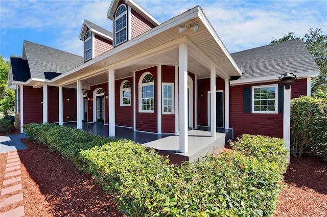 14807 Capps Estates Ln, Wimauma, FL 33598 - view of front of property with a porch and roof with shingles