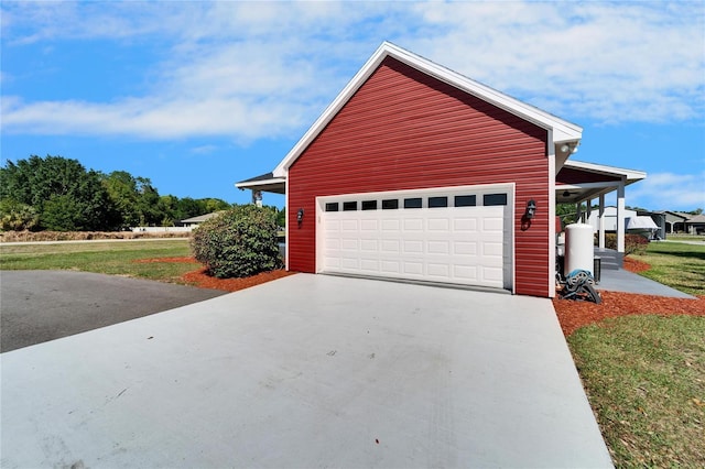 14807 Capps Estates Ln, Wimauma, FL 33598 - garage with concrete driveway