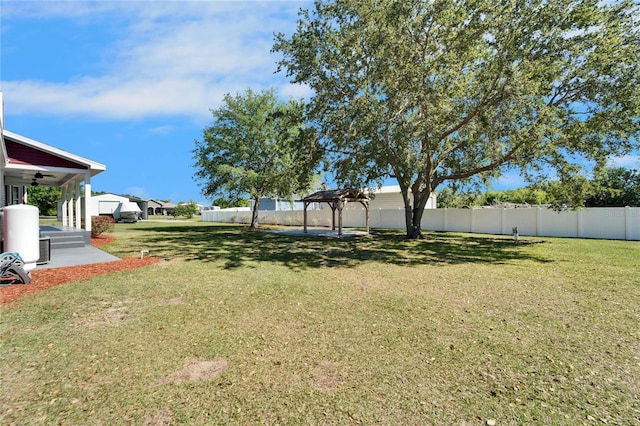 14807 Capps Estates Ln, Wimauma, FL 33598 - view of yard with ceiling fan and a gazebo